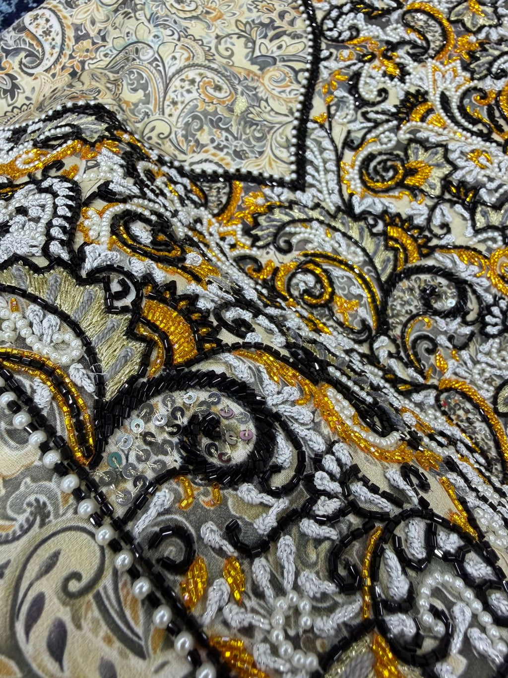 Exclusive Emirati Mukhawar Fabric – Hand Beaded Neck & Sleeves (Unstitched)